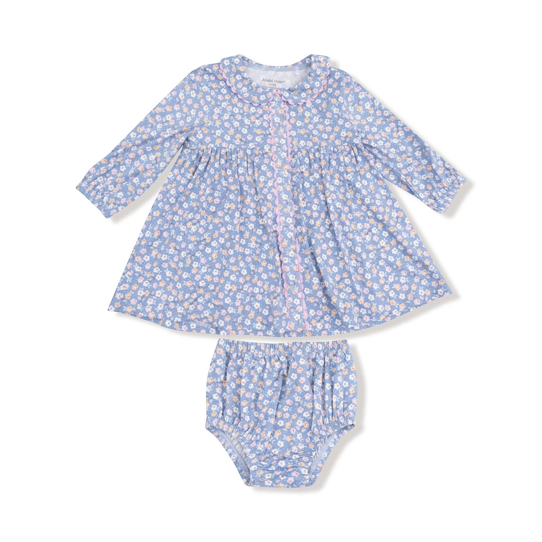 Baby dress and bloomers set with floral pattern on a white background