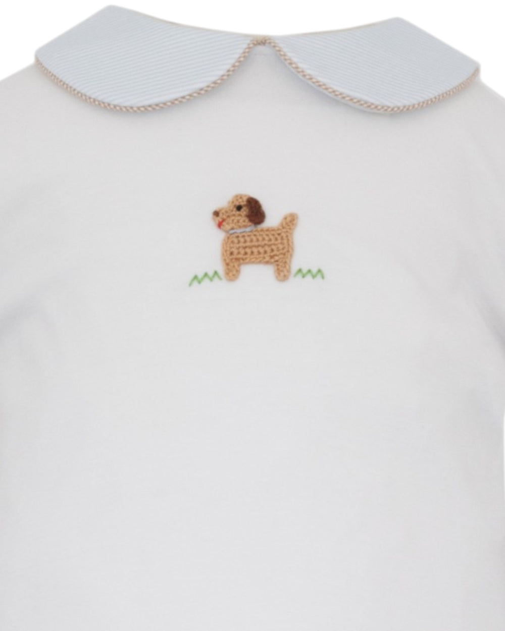 White baby bodysuit featuring a white striped Peter Pan collar with a beige trim and a crocheted dog patch on the chest, that store