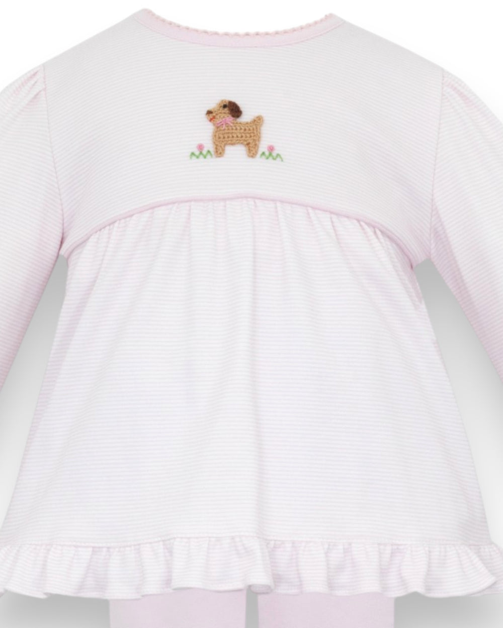A close-up of a light pink and white vertically striped long-sleeve baby top, showing the back view with a small embroidered dog motif on the upper back, that store