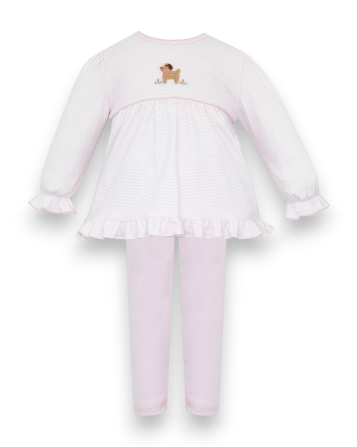 A two-piece baby pajama set featuring a long-sleeve top and matching pants in light pink. The top has a ruffled hem, long sleeves with ruffled cuffs, and a small embroidered dog motif on the upper back, that store