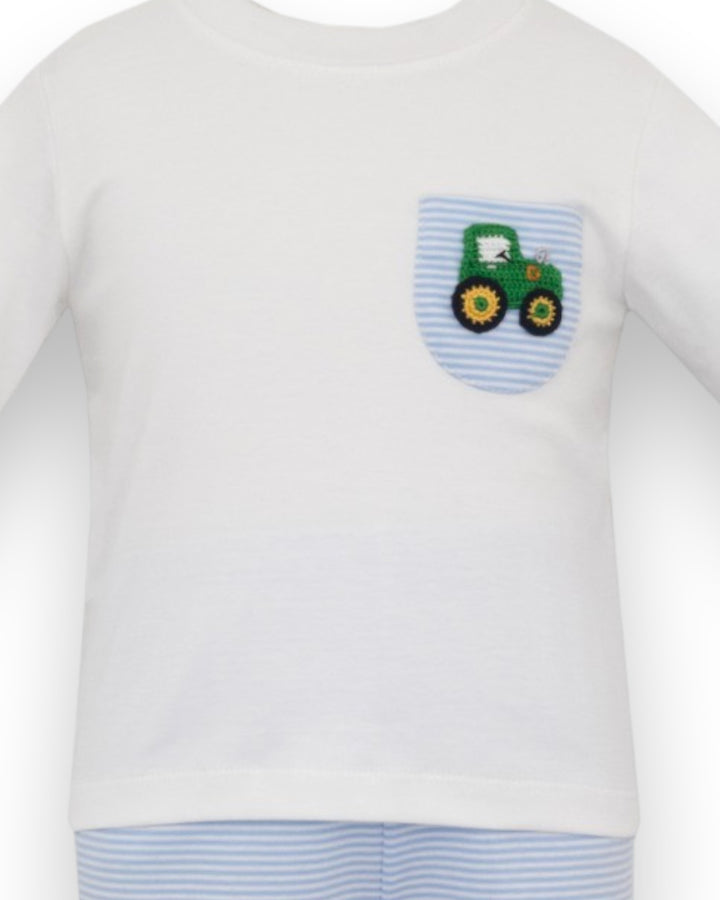 A white long-sleeve baby t-shirt featuring a light blue and white striped chest pocket with a green tractor applique, that store