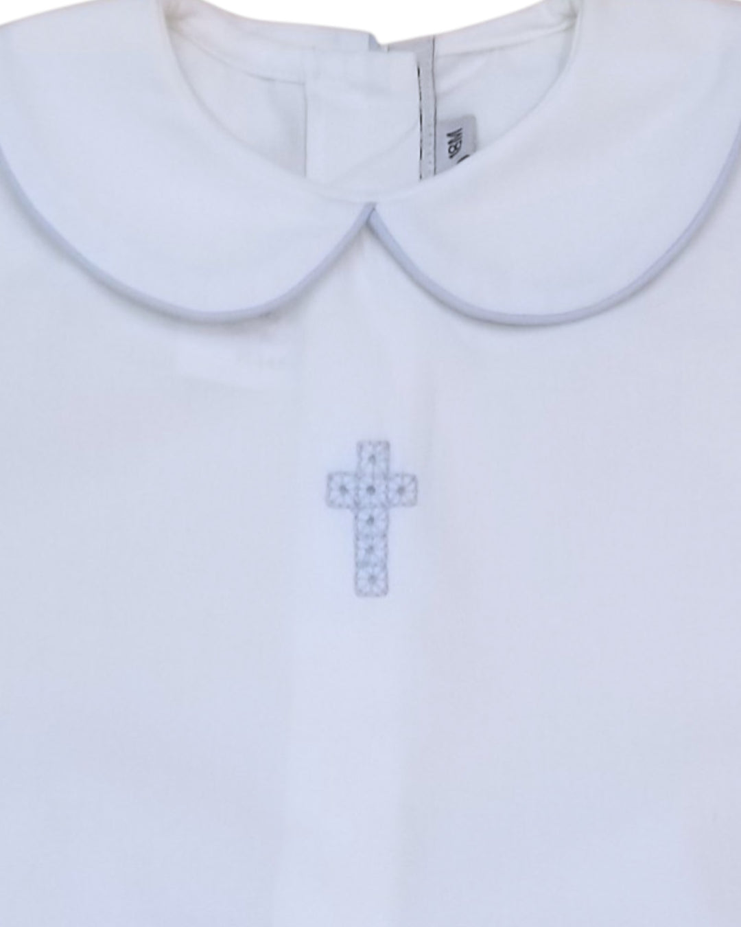 Light blue shirt with a cross design on a white background