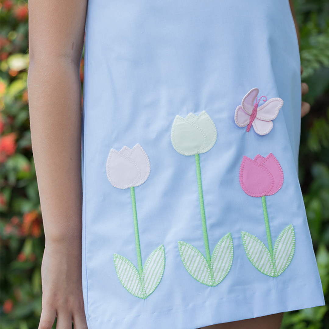 Garden of Tulips Blue Dress, child close