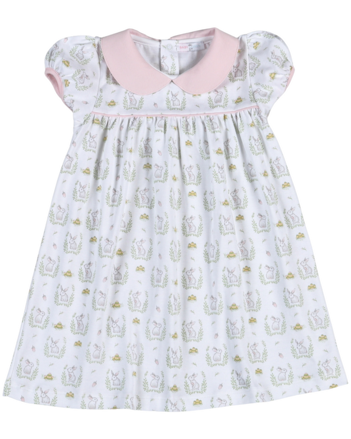 Baby dress with bunny print and pink collar on a white background