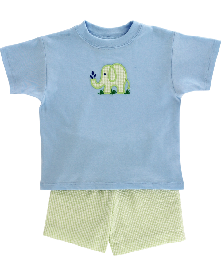 Children's blue t-shirt with a green elephant design and matching shorts on a white background