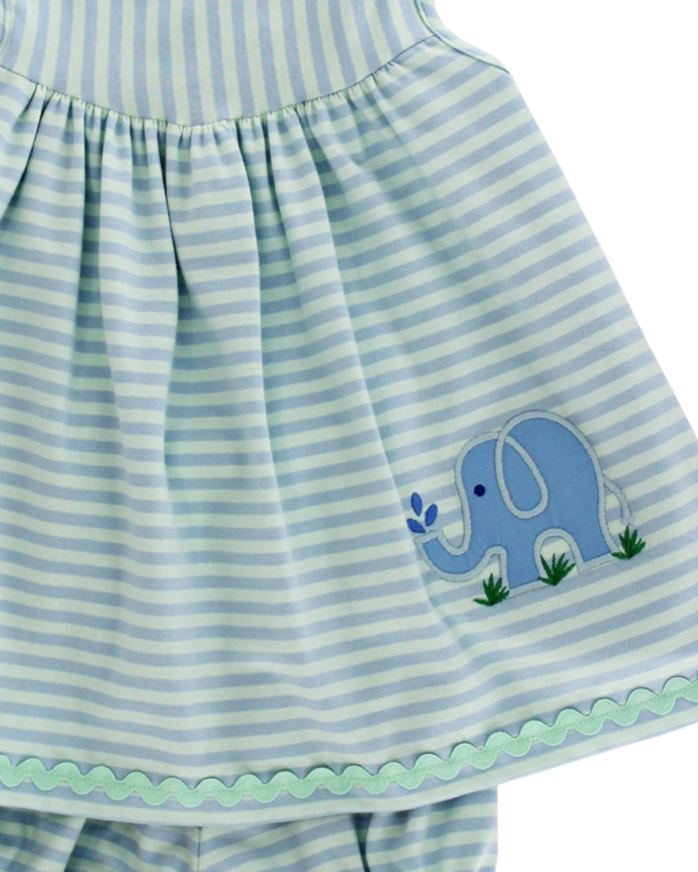 Striped dress with an elephant applique on a white background