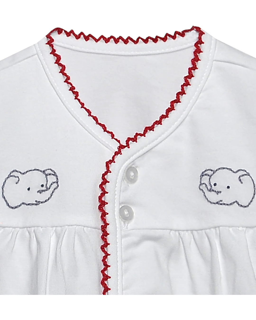 White baby cardigan with red trim and elephant embroidery on a white background