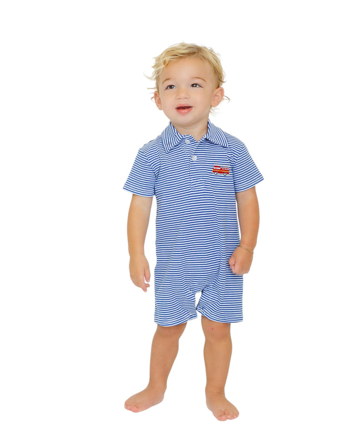 Child wearing a blue striped outfit with a small logo on a white background