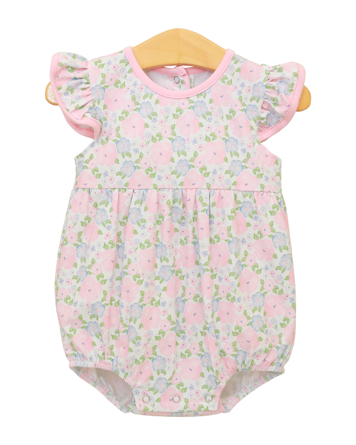 Floral baby romper with ruffled sleeves on a white background