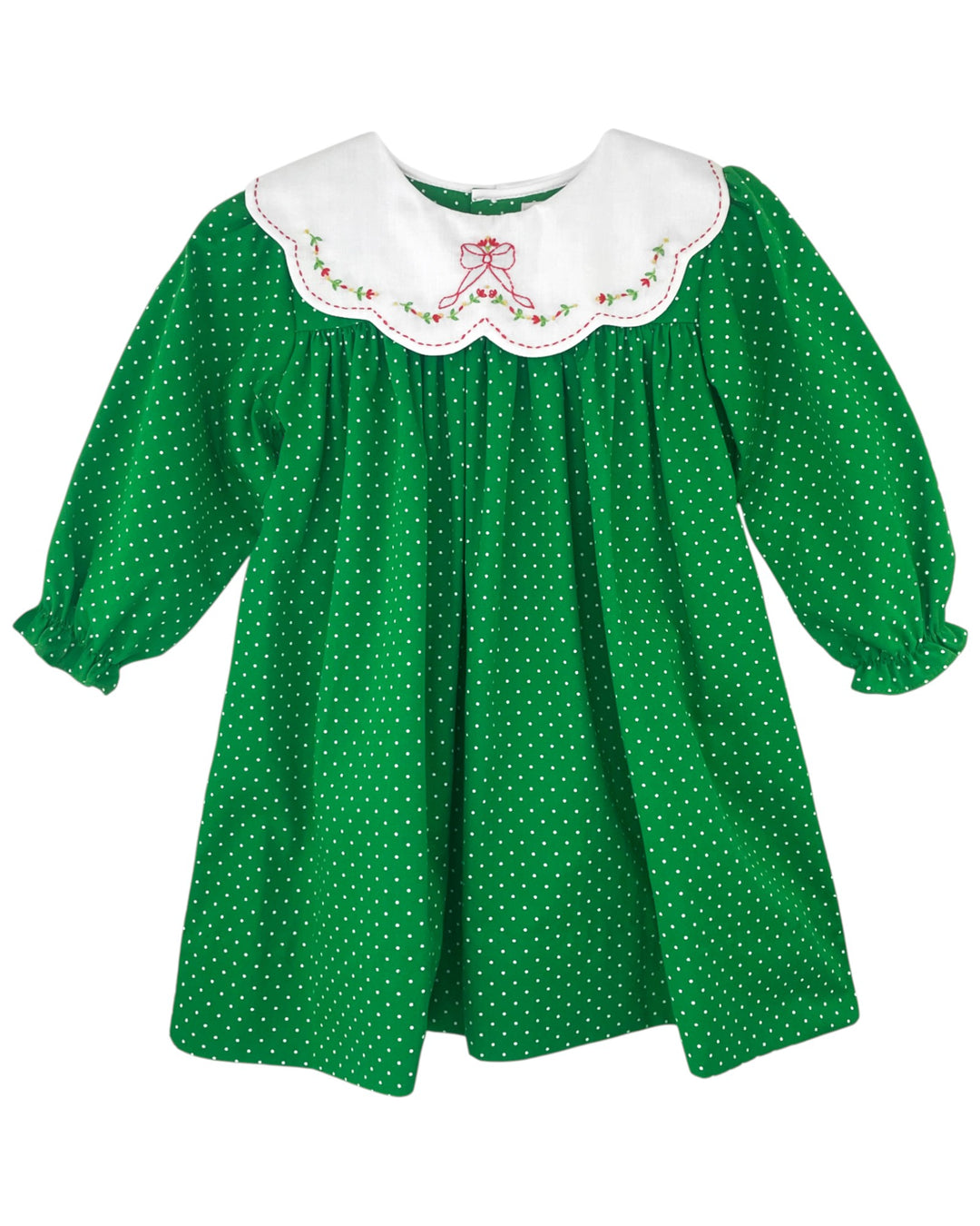 Green polka dot dress with white embroidered collar on a white background