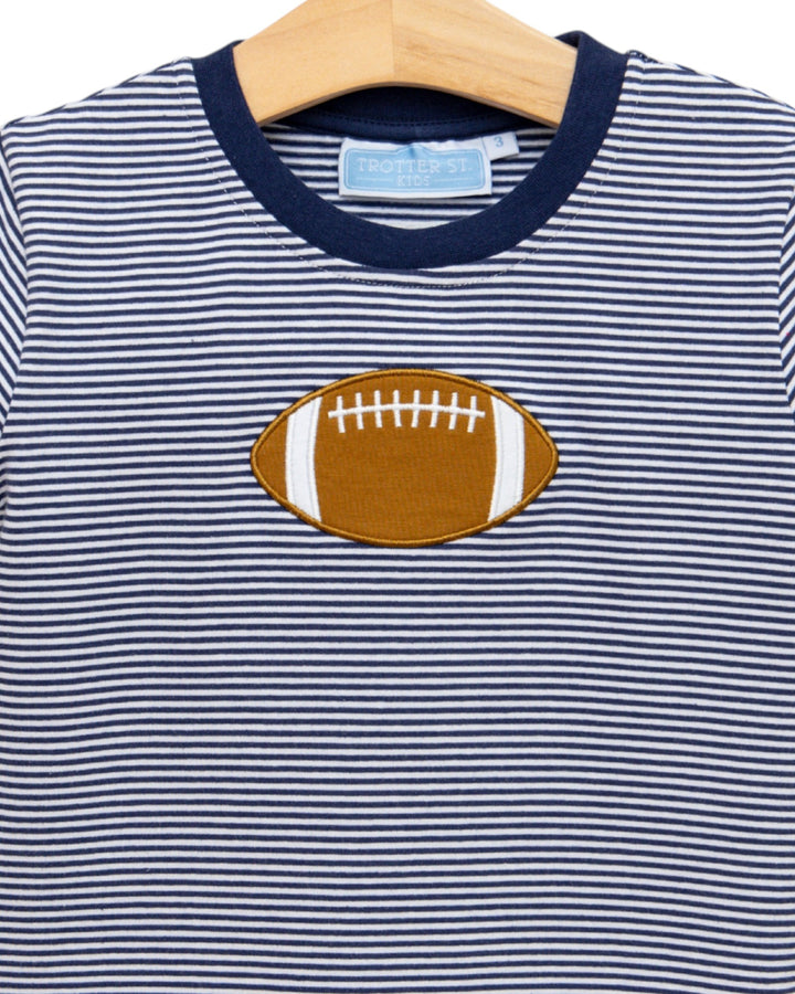Navy and white striped shirt with a football patch on a hanger