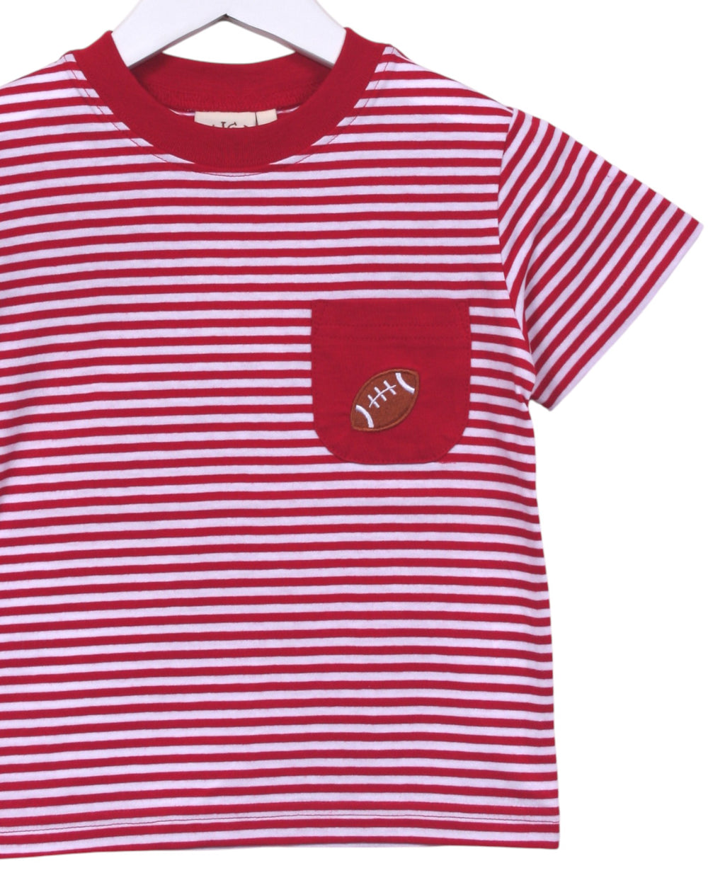 Red and white striped t-shirt with a pocket on a hanger