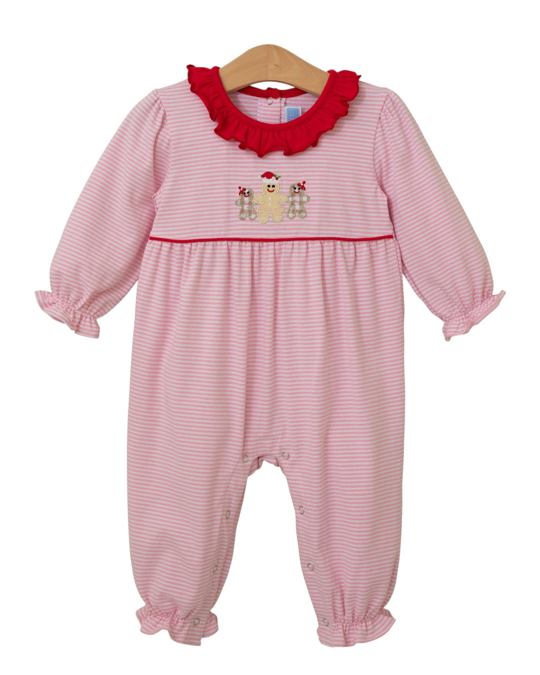 Pink and red baby romper with ruffled collar on a white background