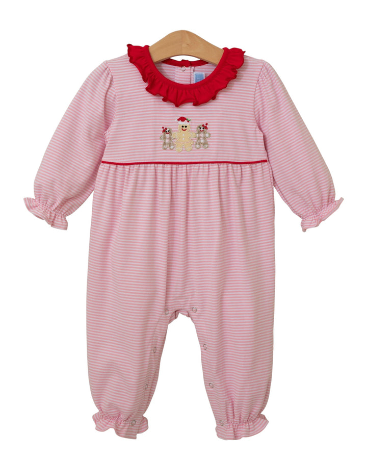 Pink and red baby romper with ruffled collar on a white background