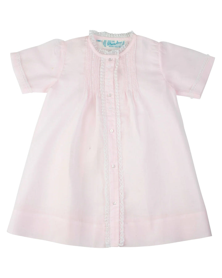 Pink dress with short sleeves on a white background