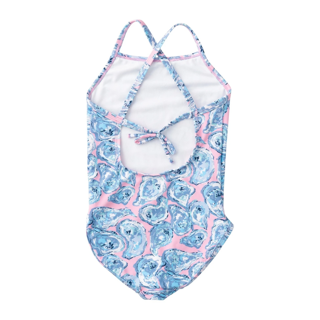 Hexagonal swimsuit with blue and pink floral pattern on a white background