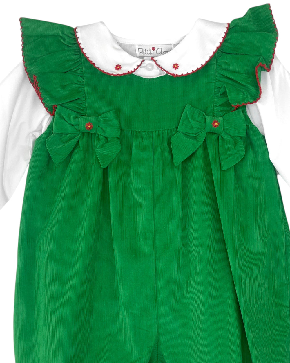 Green dress with white collar and red trim on a white background