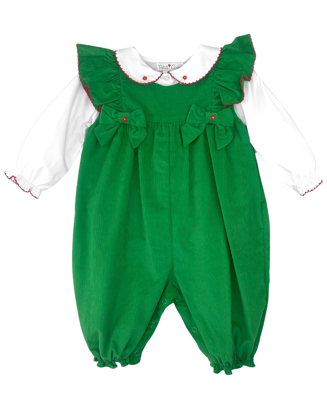 Green baby romper with white shirt on a white background
