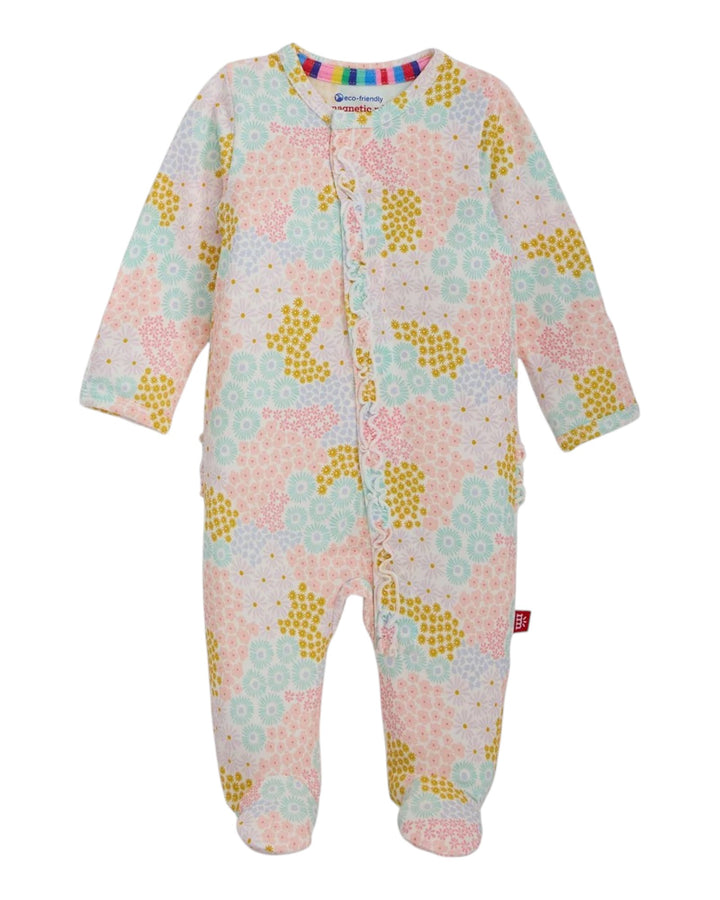 Floral patterned baby onesie on a white background