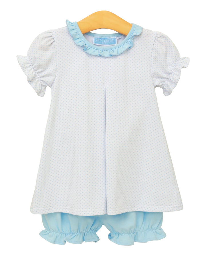 Baby dress with ruffled collar and bloomers on a white background