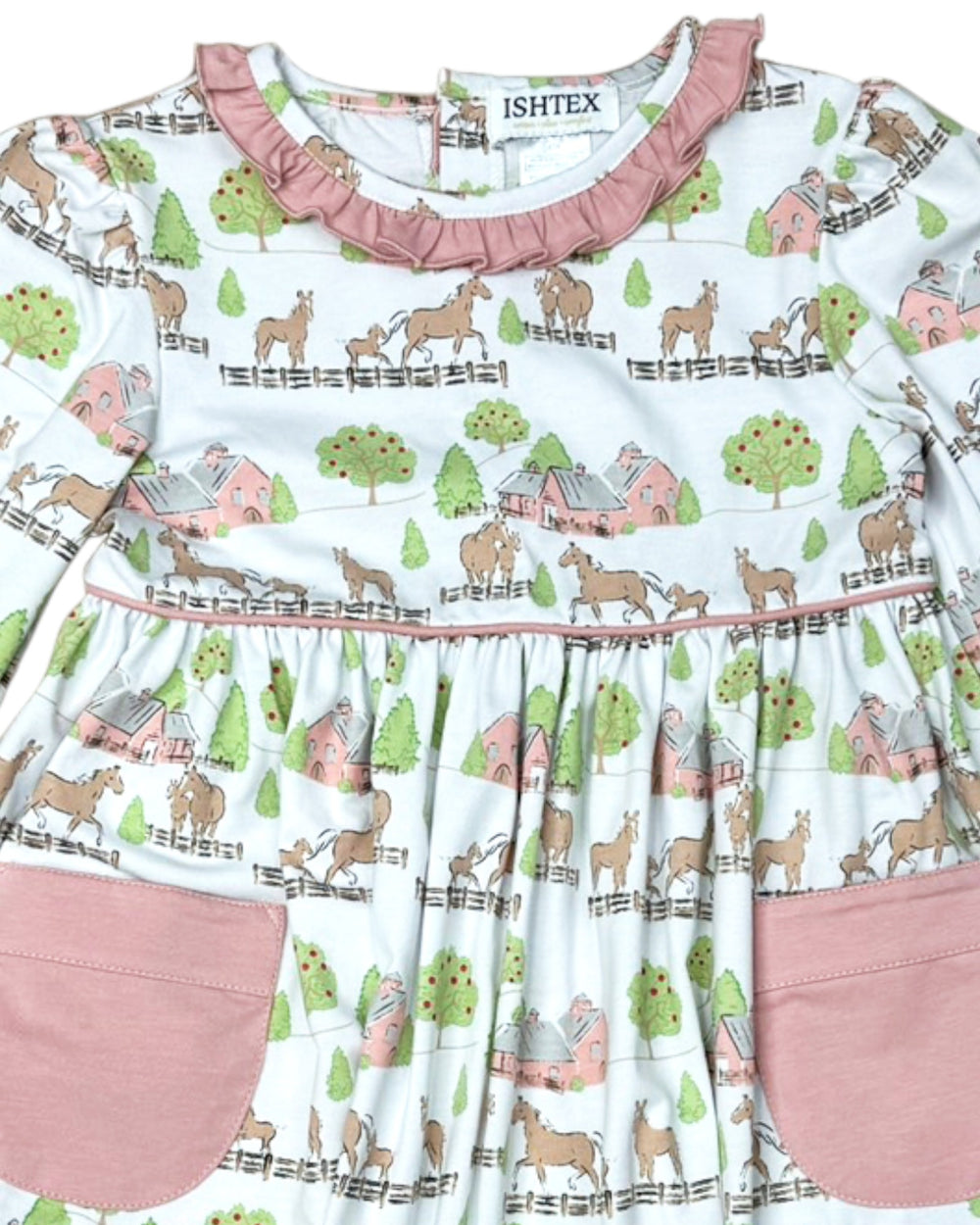 Children's dress with farm animal pattern and pink accents