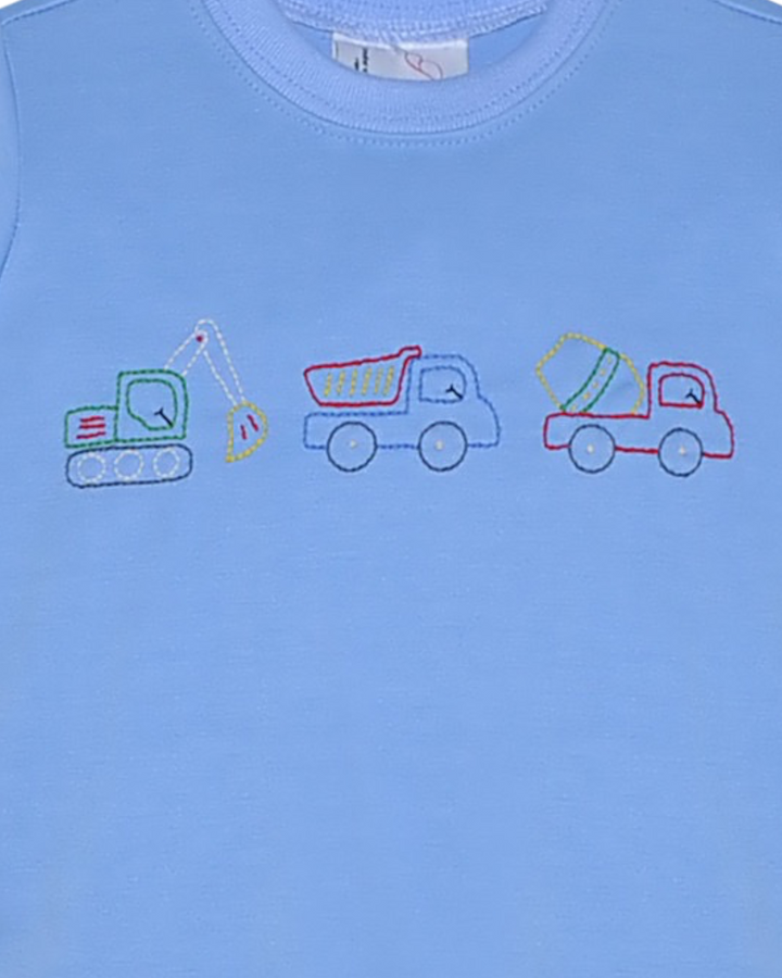 Blue t-shirt with embroidered construction vehicle designs on a plain background