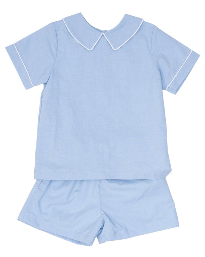 Light blue children's pajama set with a collar on a white background