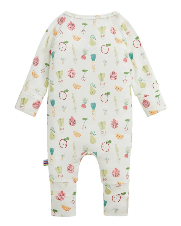 A baby long-sleeve footless one-piece romper with an all-over vegetable and fruit print on a cream background, shown flat against a white background, that store