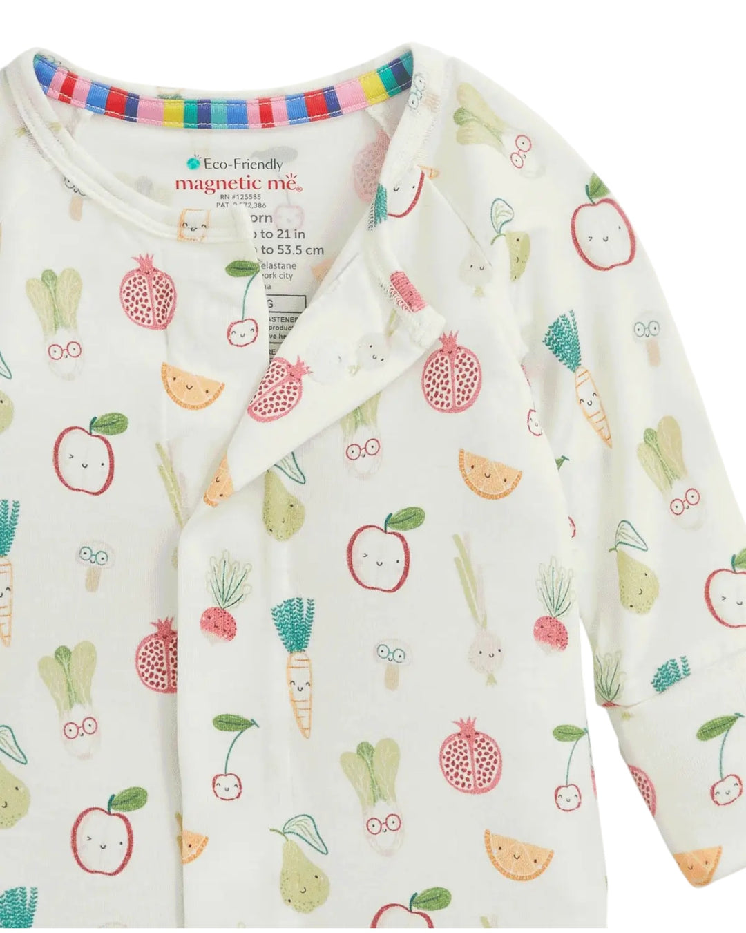 A baby long-sleeve sleep sack with a white background and a colorful cartoon fruit and vegetable print, featuring a magnetic snap closure at the neckline, that store