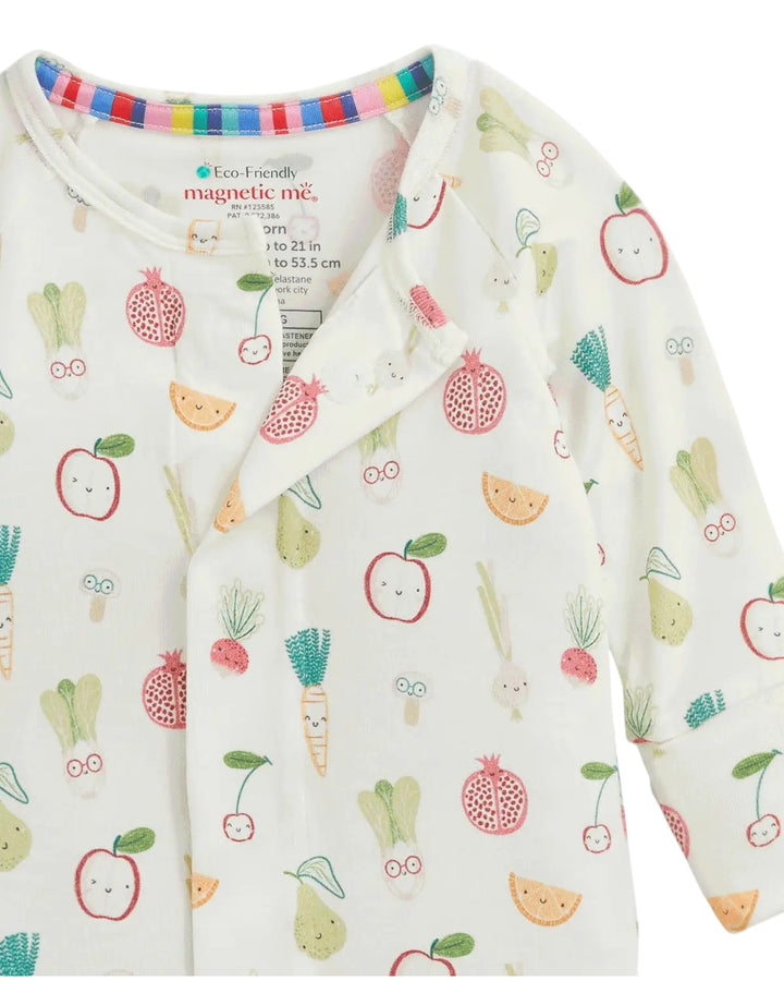 A baby long-sleeve sleep sack with a white background and a colorful cartoon fruit and vegetable print, featuring a magnetic snap closure at the neckline, that store