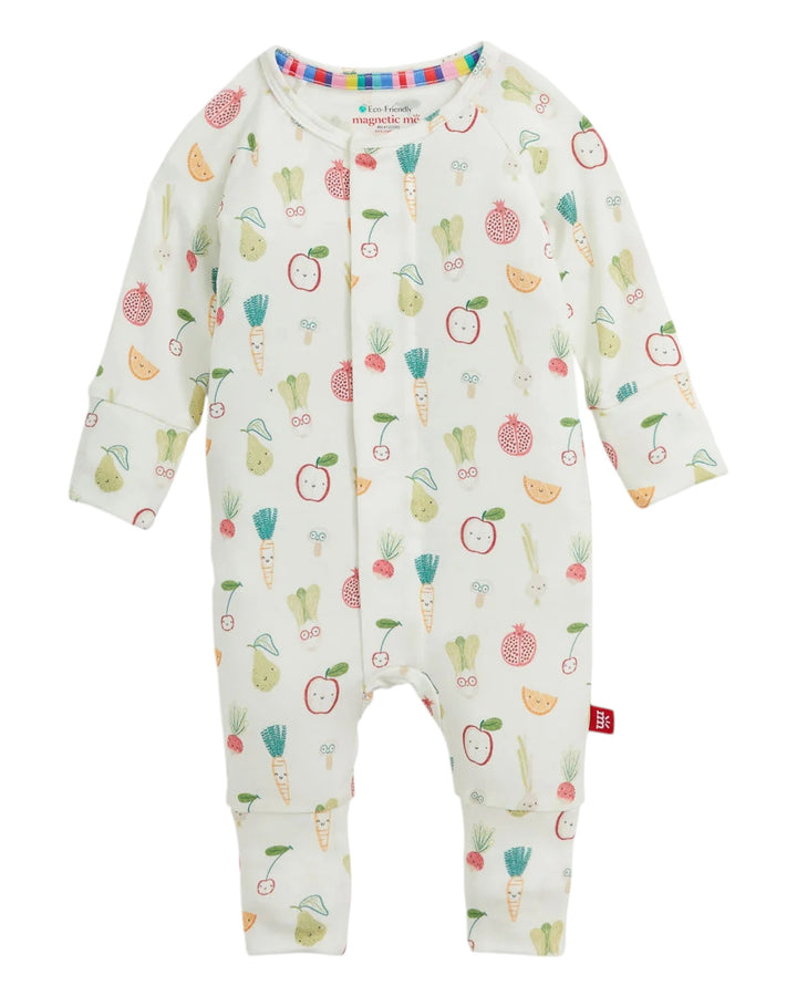 A baby long-sleeve footless one-piece romper in off-white, featuring an all-over colorful vegetable and fruit print including carrots, pears, apples, and strawberries. The brand name &