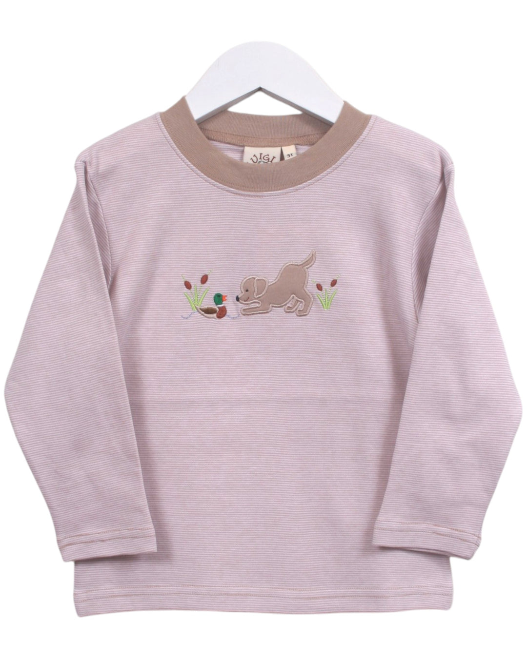 A light pink long-sleeve baby t-shirt with a beige crew neck and a central embroidered dog motif, hanging on a white hanger against a white background, that store