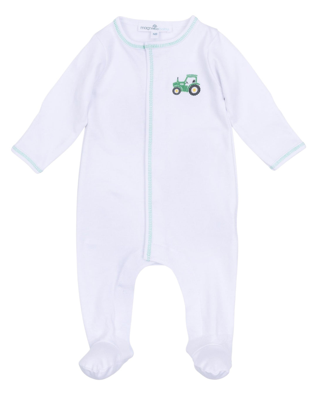 White baby onesie with green tractor design on a white background