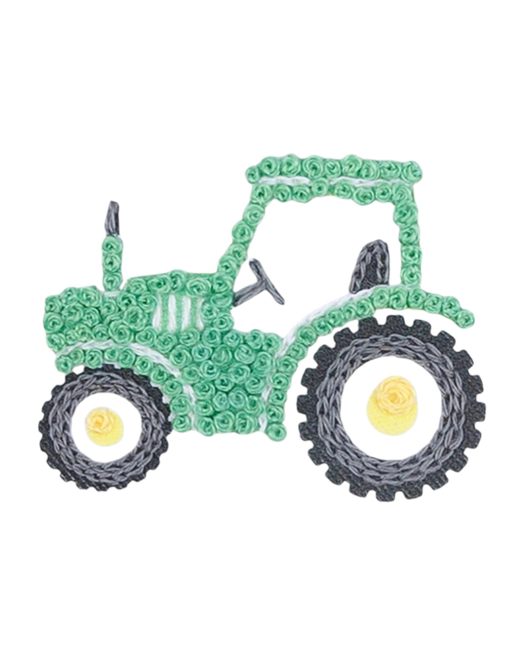 Green toy tractor made of interlocking bricks on a white background