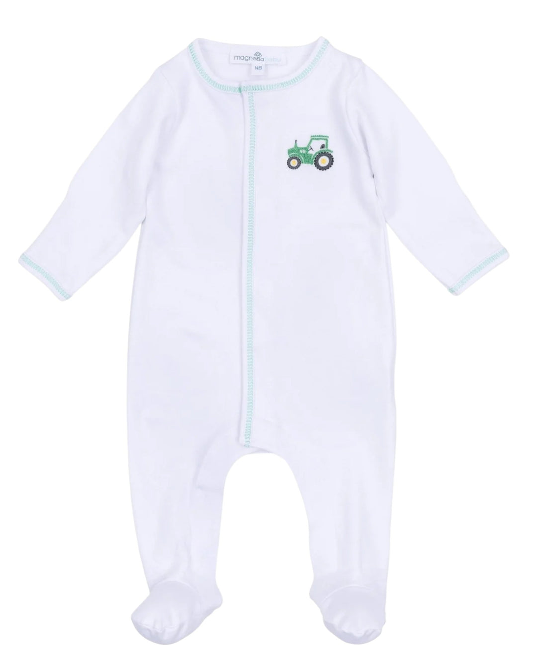 White baby onesie with green tractor design on a white background