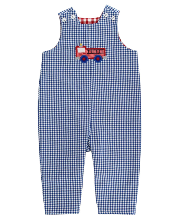 Blue gingham overalls with a red fire truck design on a white background