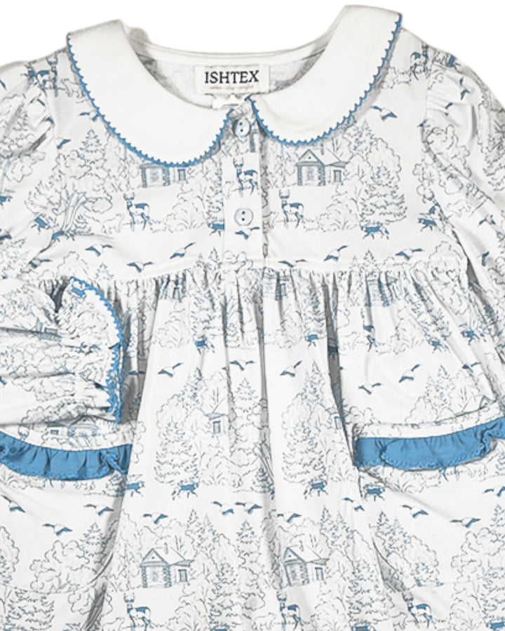 Children's dress with blue and white pattern on a white background, featuring the brand 'ISHTEX'.