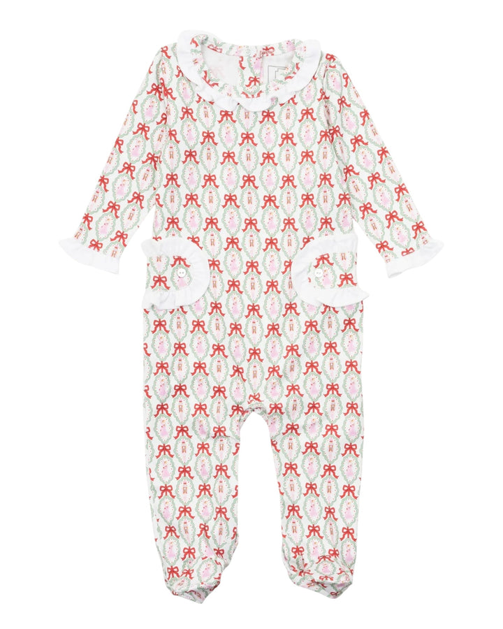 Baby onesie with red pattern on a white background