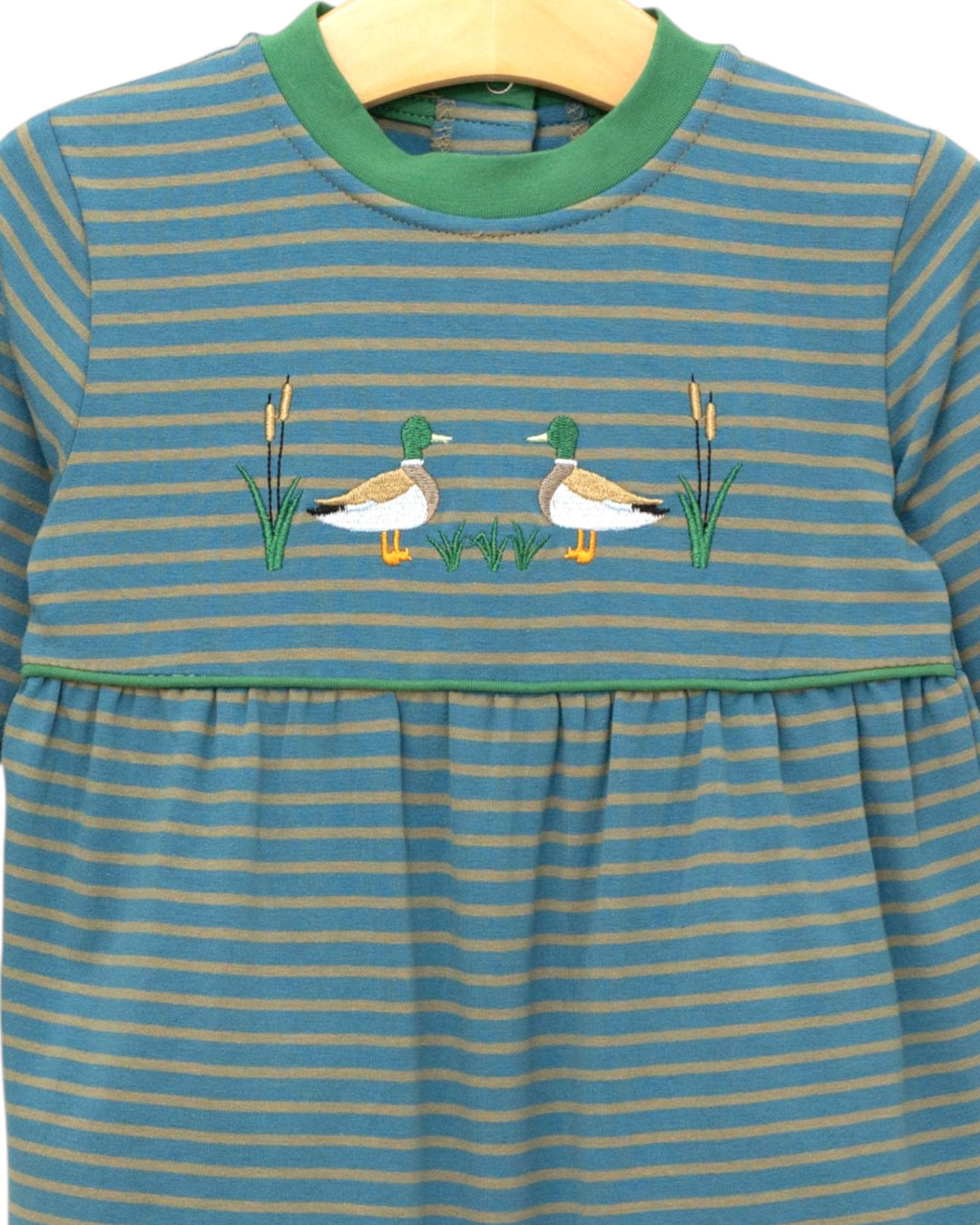 Striped dress with duck design on a hanger
