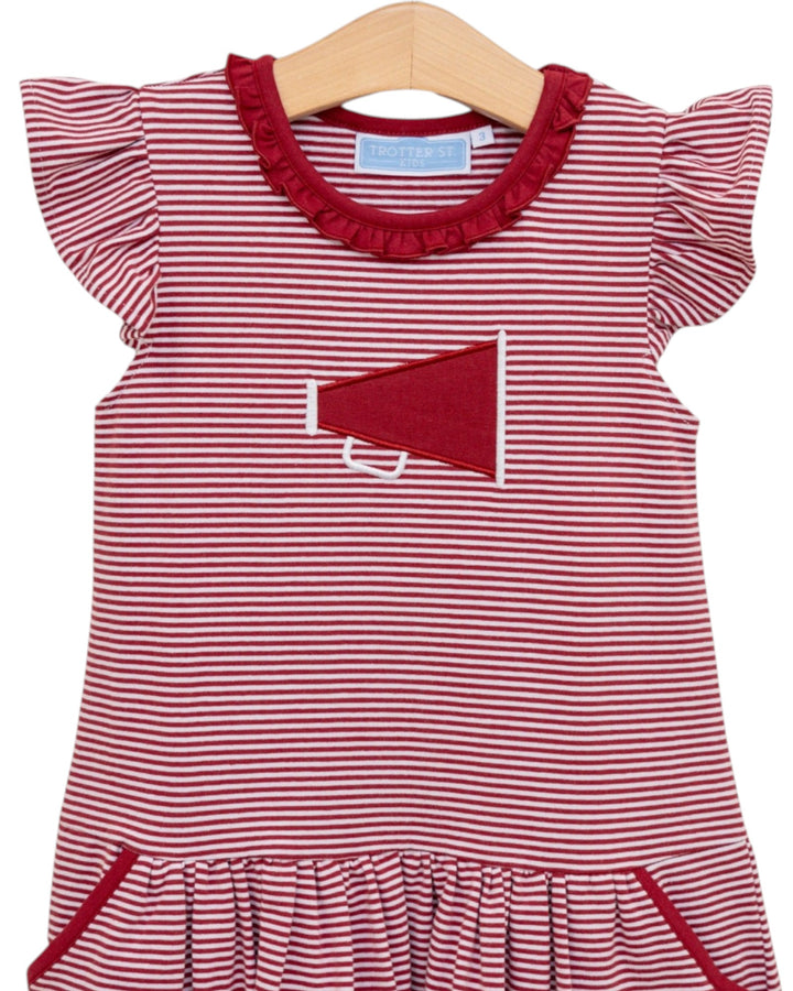 Red and white striped dress with ruffled collar on a hanger