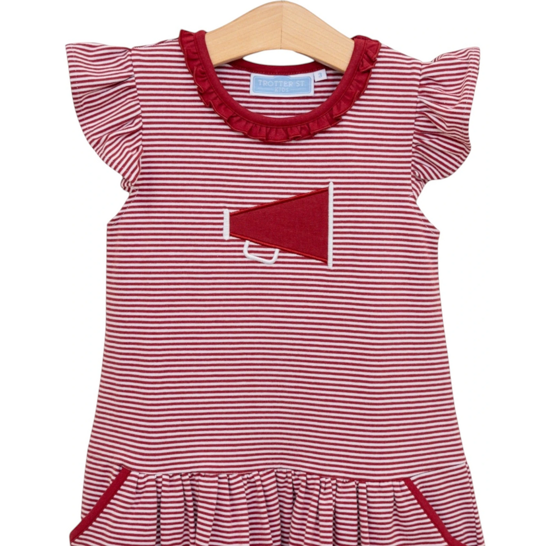 Red and white striped dress with ruffled collar on a hanger