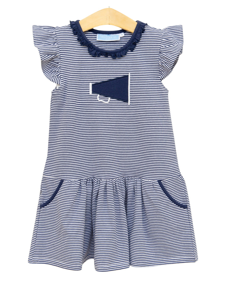 Navy and white striped dress with a megaphone design on a hanger