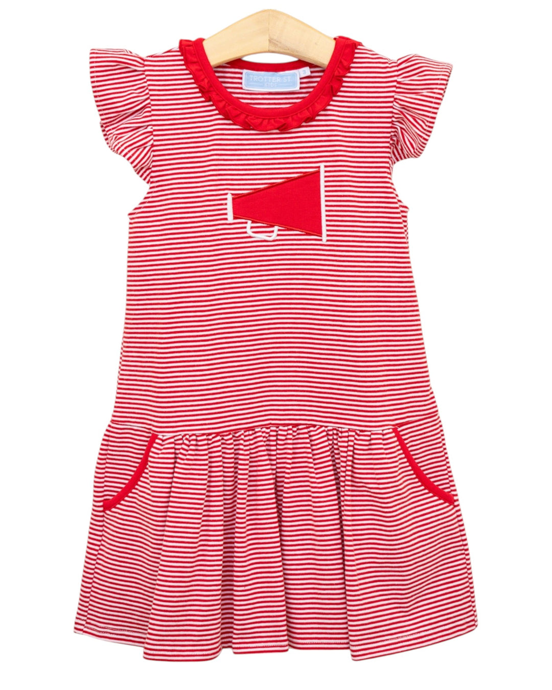 Red and white striped dress with a megaphone design on a hanger