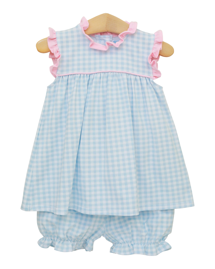 Baby dress and bloomers set with blue checkered pattern and pink trim on a white background