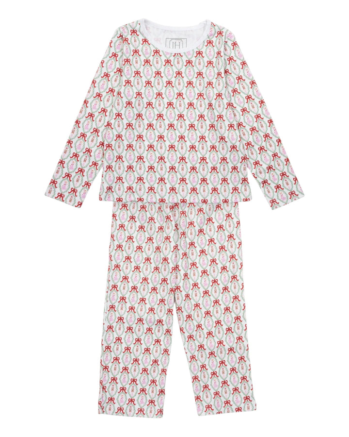 Children's pajama set with red and white pattern on a white background