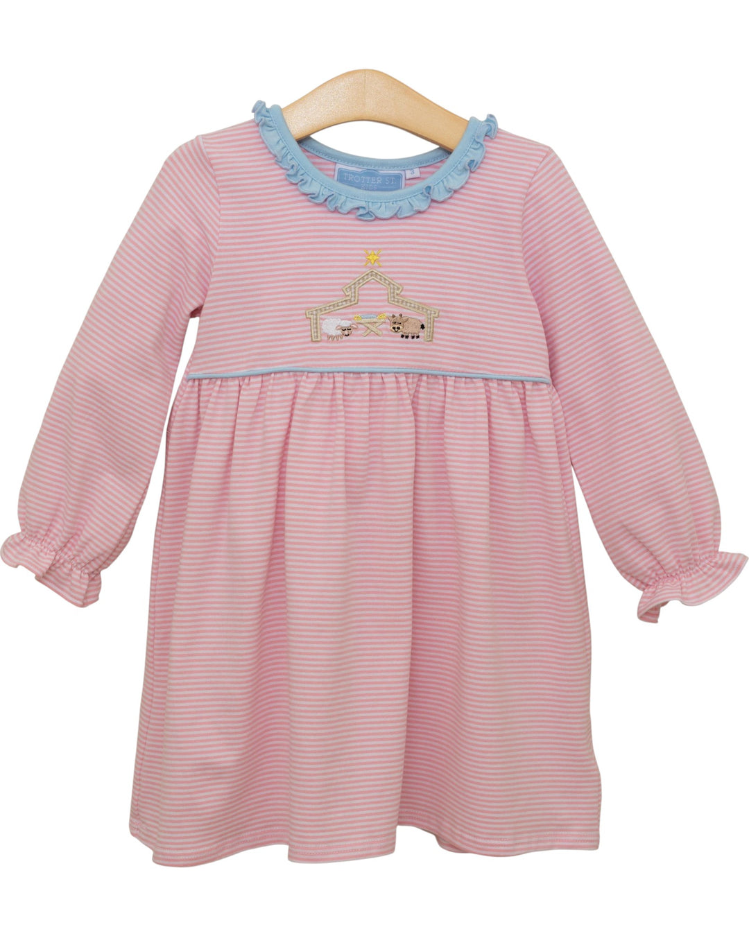 Pink striped dress with blue trim on a hanger against a white background