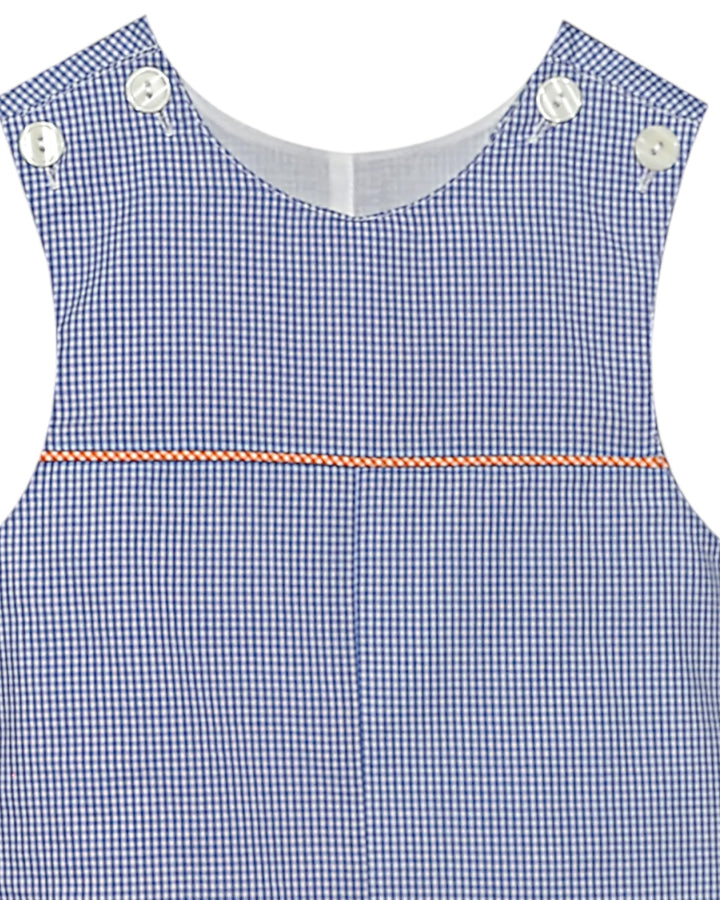 Blue checkered dress with white buttons on a white background