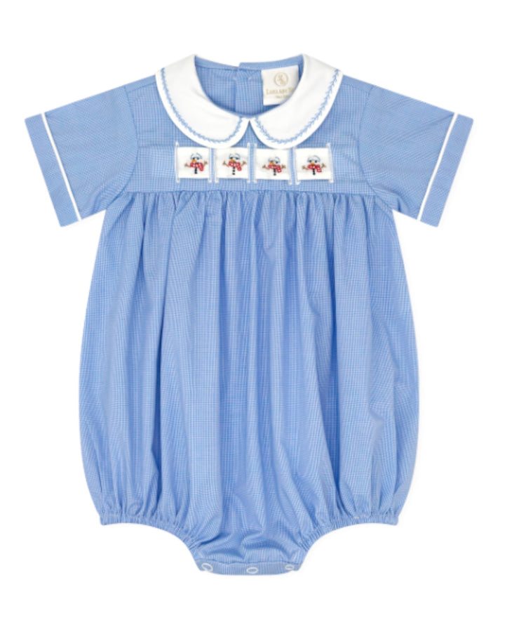 A baby short-sleeve bubble romper in light blue and white micro-check pattern, featuring a white Peter Pan collar, white piping on the sleeves, and three embroidered floral patches on the chest, that store
