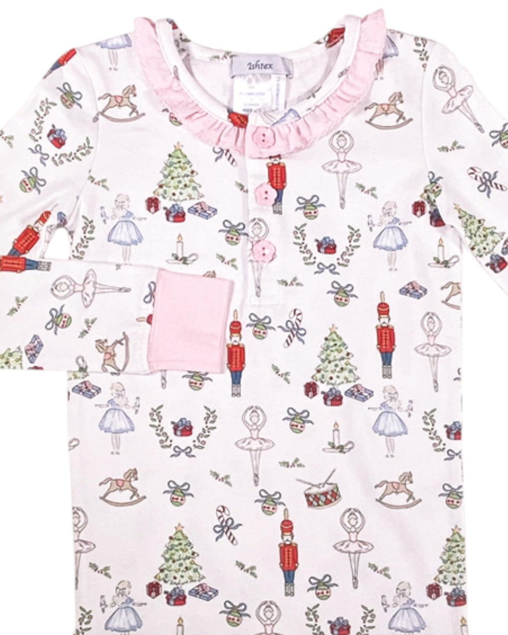 Children's pajama top with Christmas-themed pattern on a white background