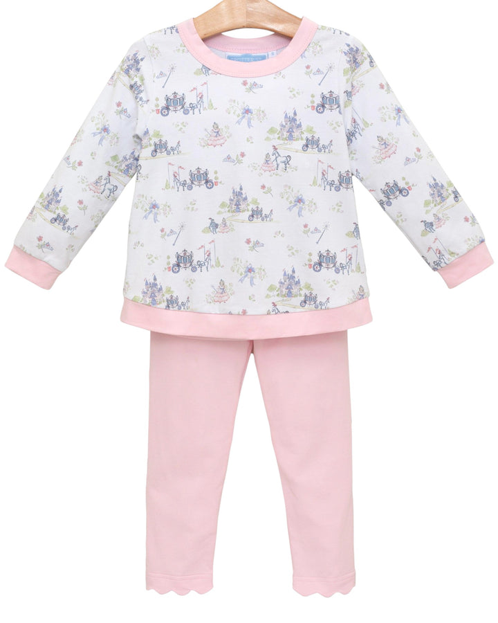 Children's pajama set with floral top and pink pants on a white background